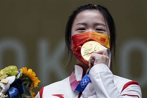China's Yang Qian claims first gold in Tokyo .
